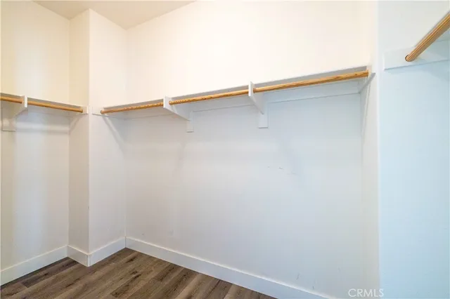a view of an empty walk in closet