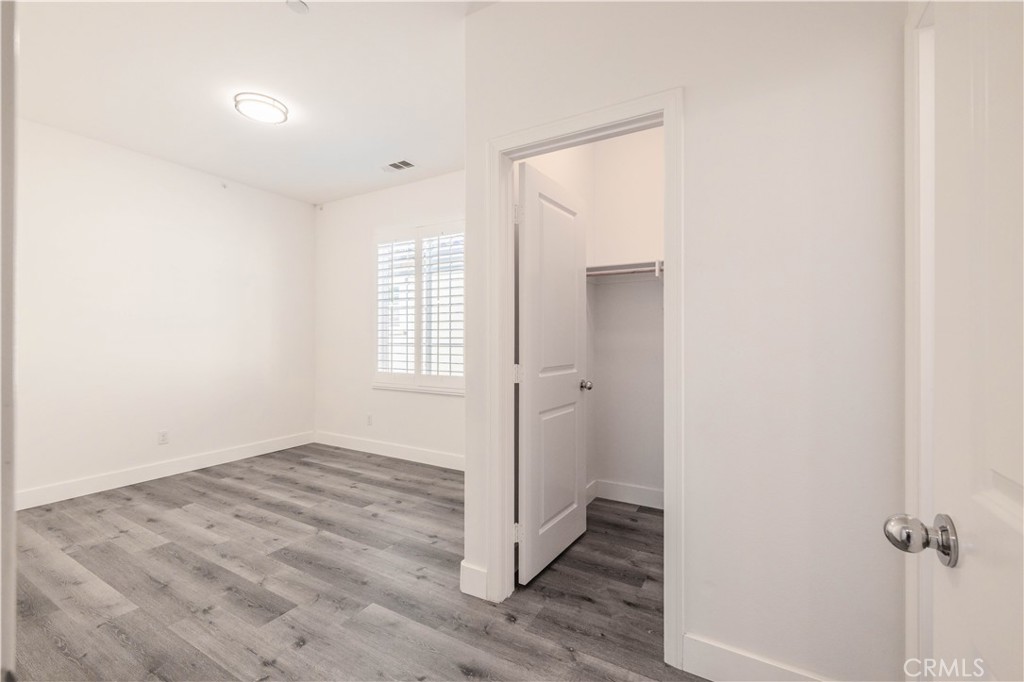 4 Lavanda Street Rancho Mission Viejo, CA 92694 - Photo 34 of 43 an empty room with wooden floor and window