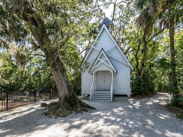 an aerial view of ocean residential houses with outdoor space and swimming pool