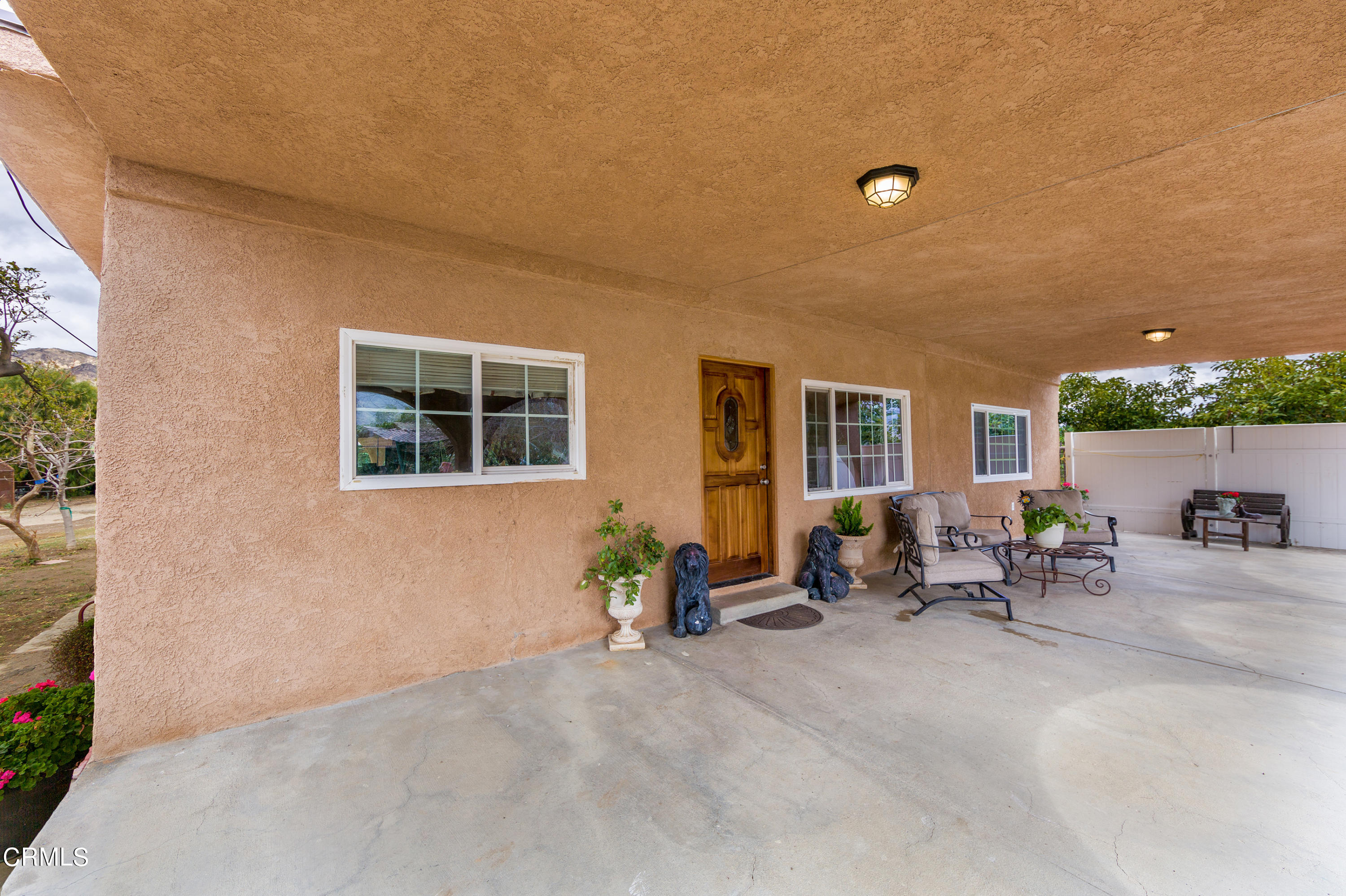 3555 East Telegraph Road Fillmore, CA 93015 - Photo 2 of 21 a living room with furniture and potted plants