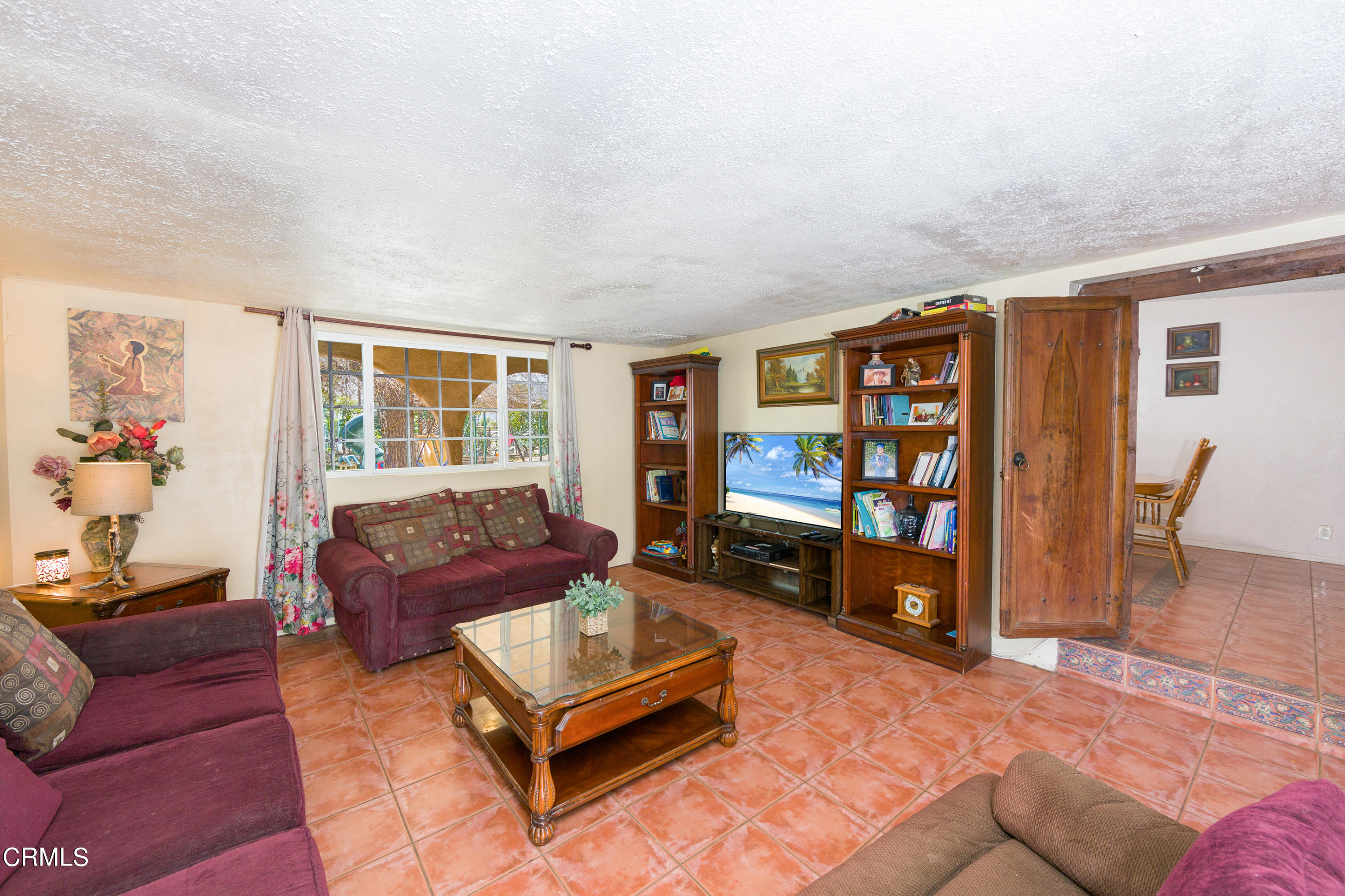 3555 East Telegraph Road Fillmore, CA 93015 - Photo 13 of 21 a living room with furniture a air conditioner and a window