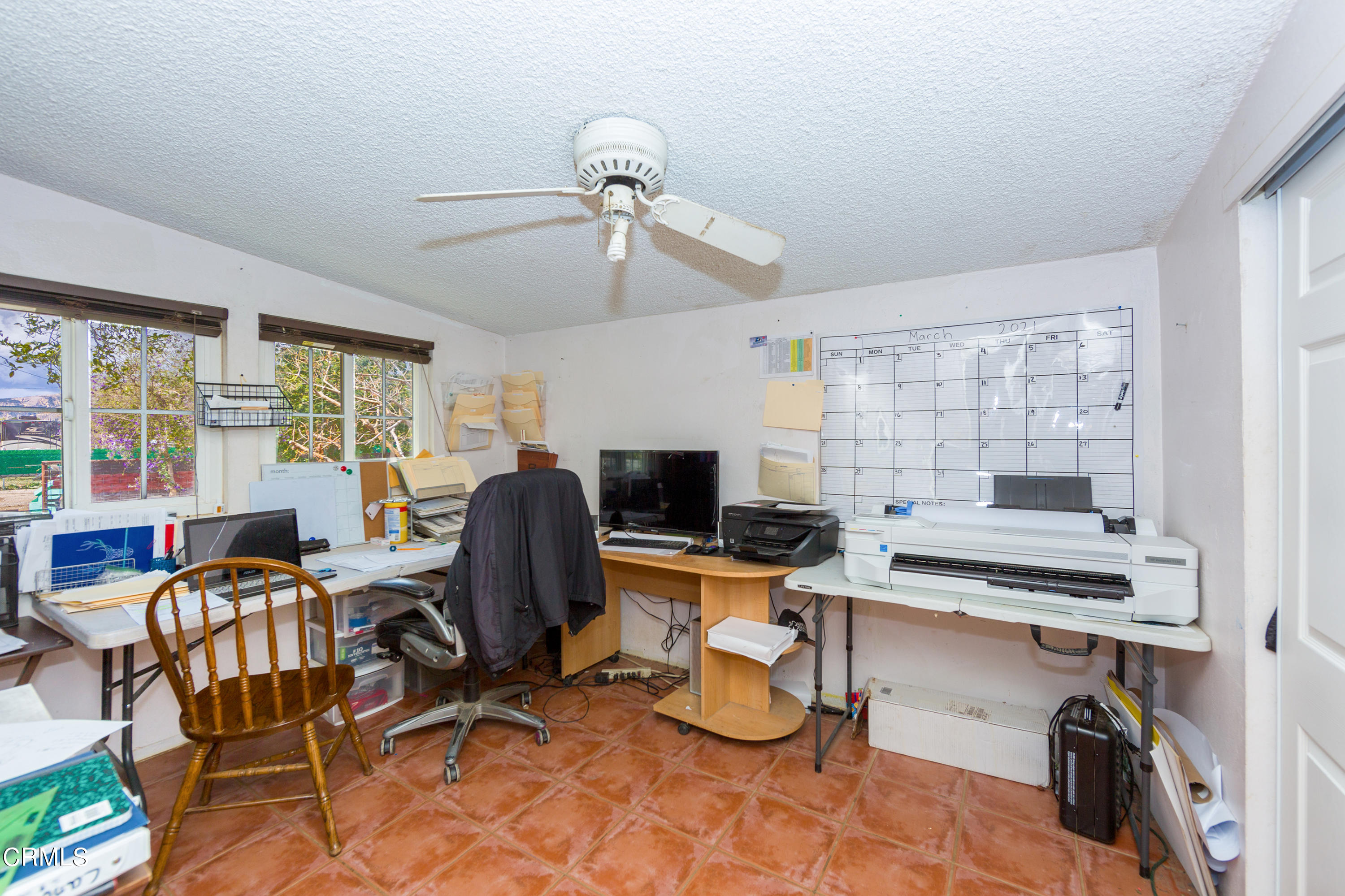 3555 East Telegraph Road Fillmore, CA 93015 - Photo 14 of 21 a view of a workspace with furniture and a kitchen