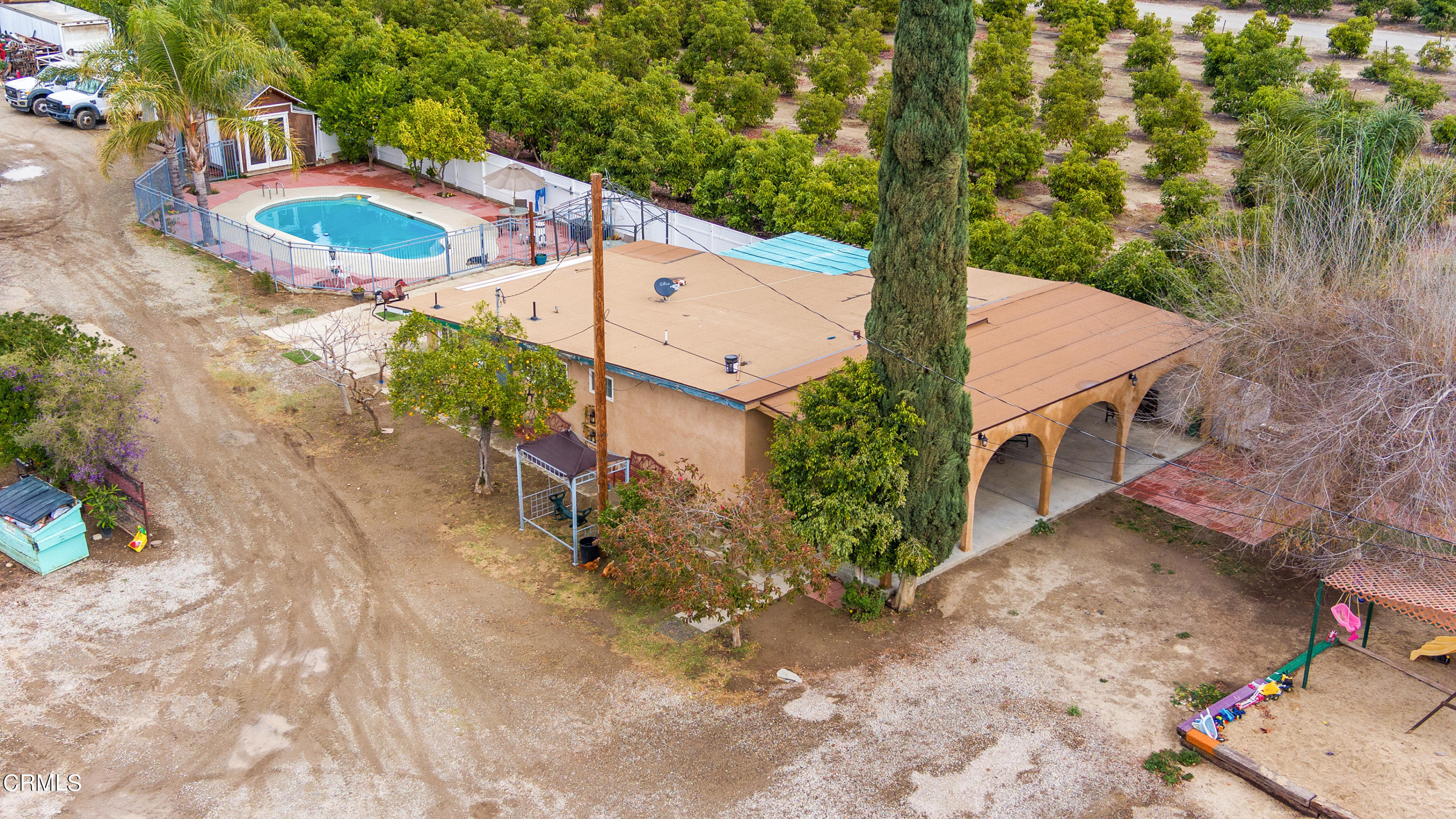 3555 East Telegraph Road Fillmore, CA 93015 - Photo 17 of 21 a view of a backyard with plants and a patio