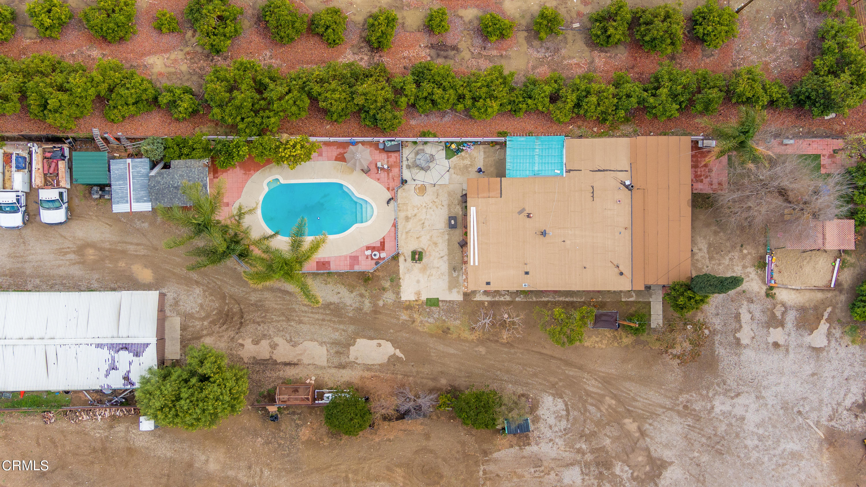 3555 East Telegraph Road Fillmore, CA 93015 - Photo 18 of 21 an aerial view of a house with a yard and a large tree