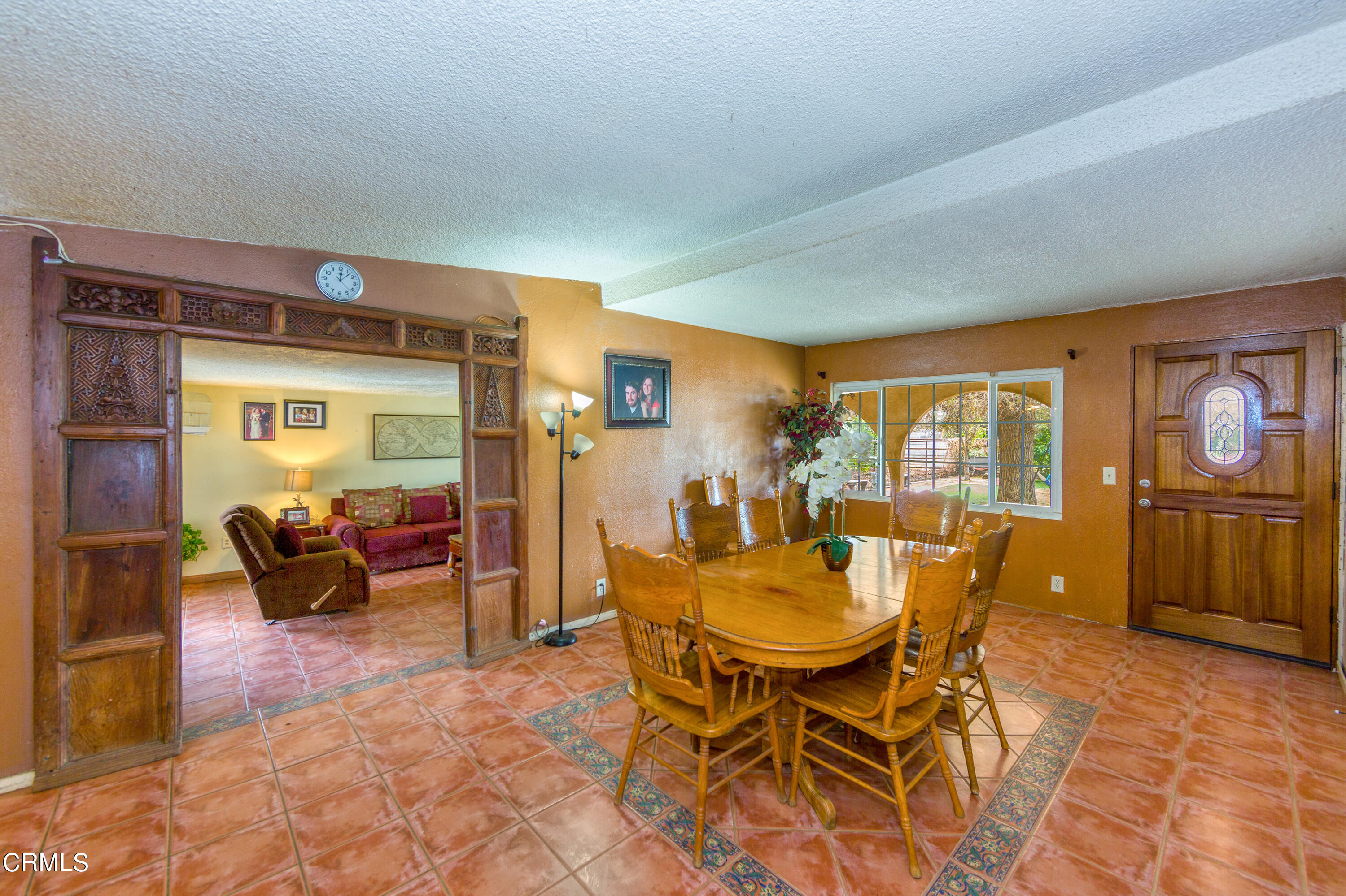 3555 East Telegraph Road Fillmore, CA 93015 - Photo 6 of 21 a dining room with furniture and a floor to ceiling window