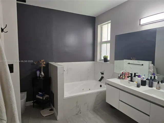 $930,000 | 11141 Northwest 77th Terrace, Doral, FL 33178