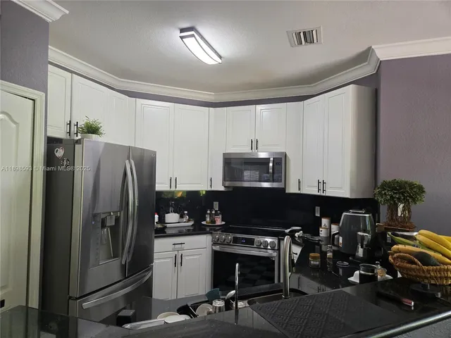 $930,000 | 11141 Northwest 77th Terrace, Doral, FL 33178