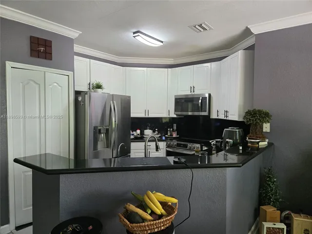 $930,000 | 11141 Northwest 77th Terrace, Doral, FL 33178