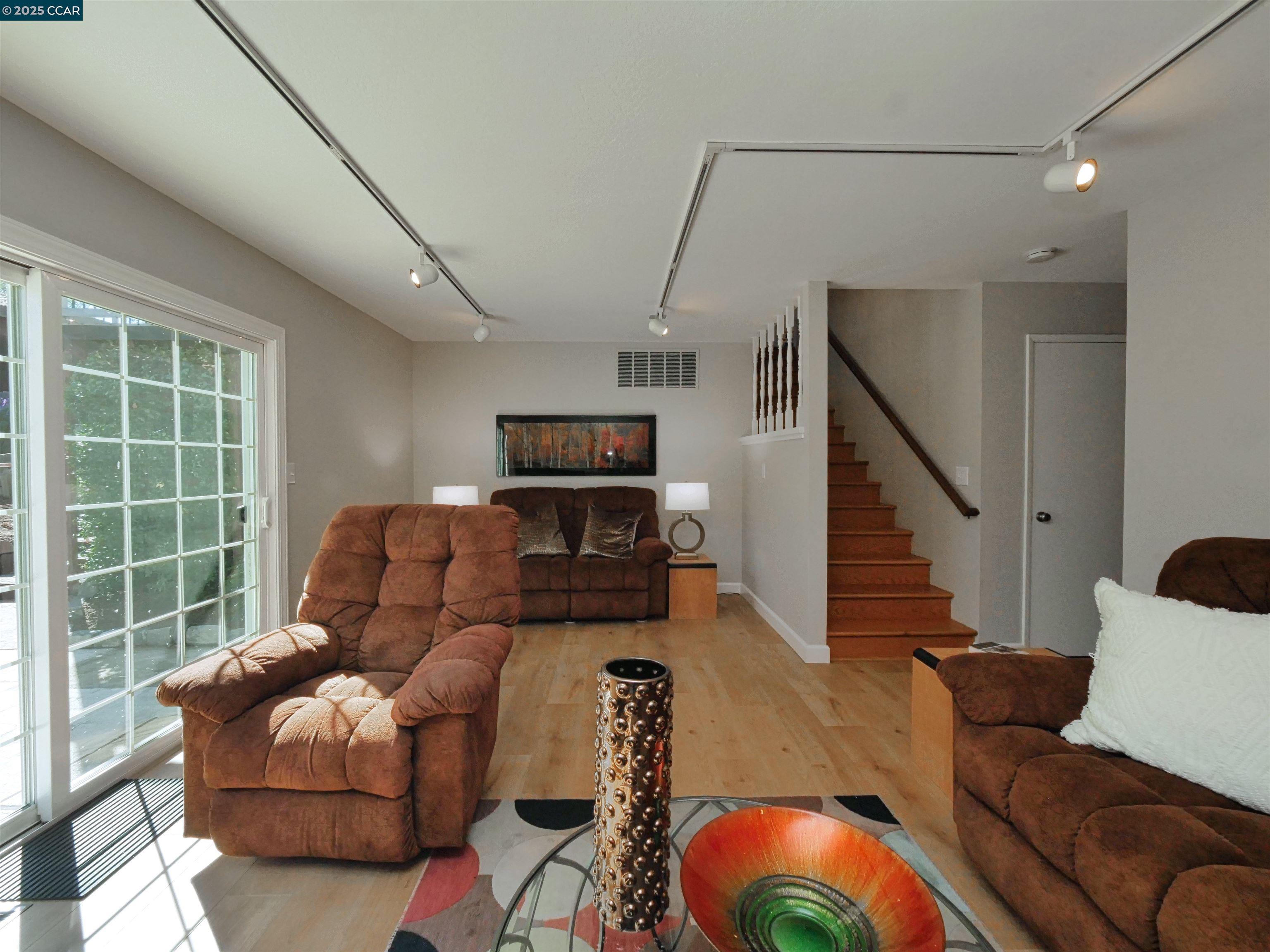 4044 Cowell Road Concord, CA 94518 - Photo 27 of 60 a living room with furniture and a large window