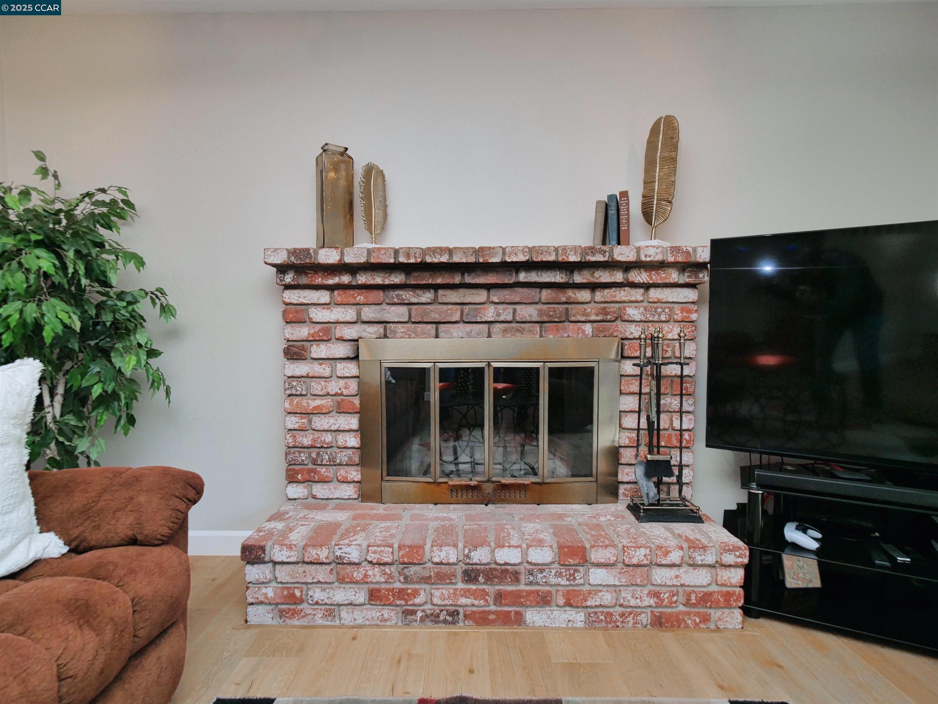 4044 Cowell Road Concord, CA 94518 - Photo 29 of 60 a living room with furniture and a fireplace