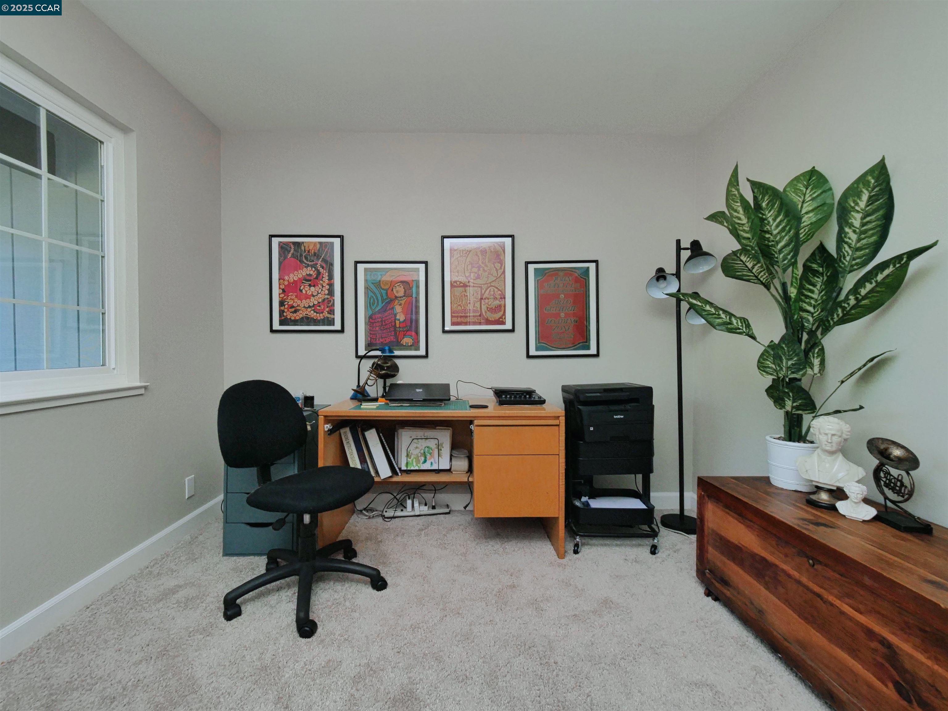 4044 Cowell Road Concord, CA 94518 - Photo 31 of 60 a view of a workspace with furniture and a window