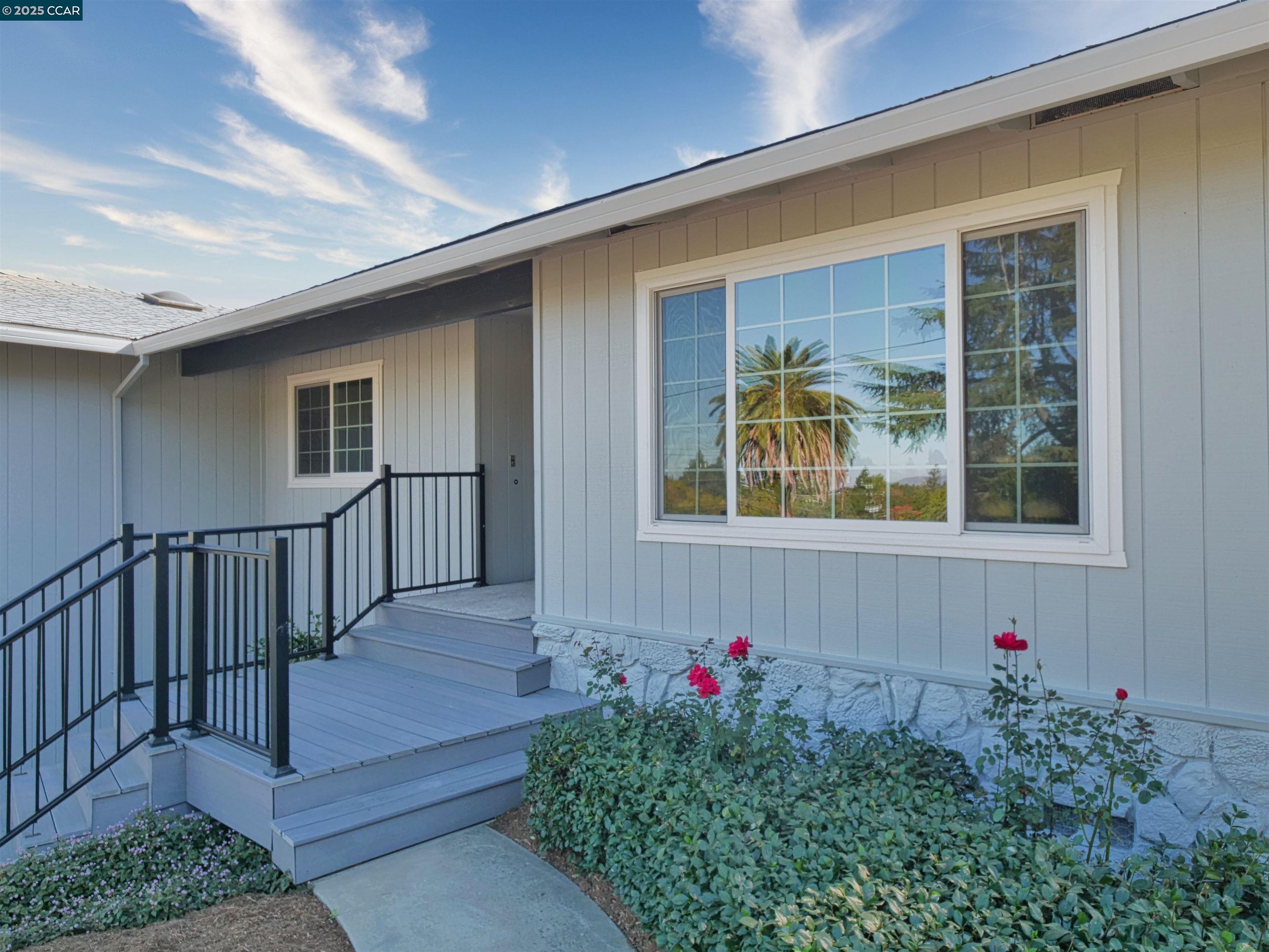 4044 Cowell Road Concord, CA 94518 - Photo 6 of 60 a view of a house with a small yard and potted plants