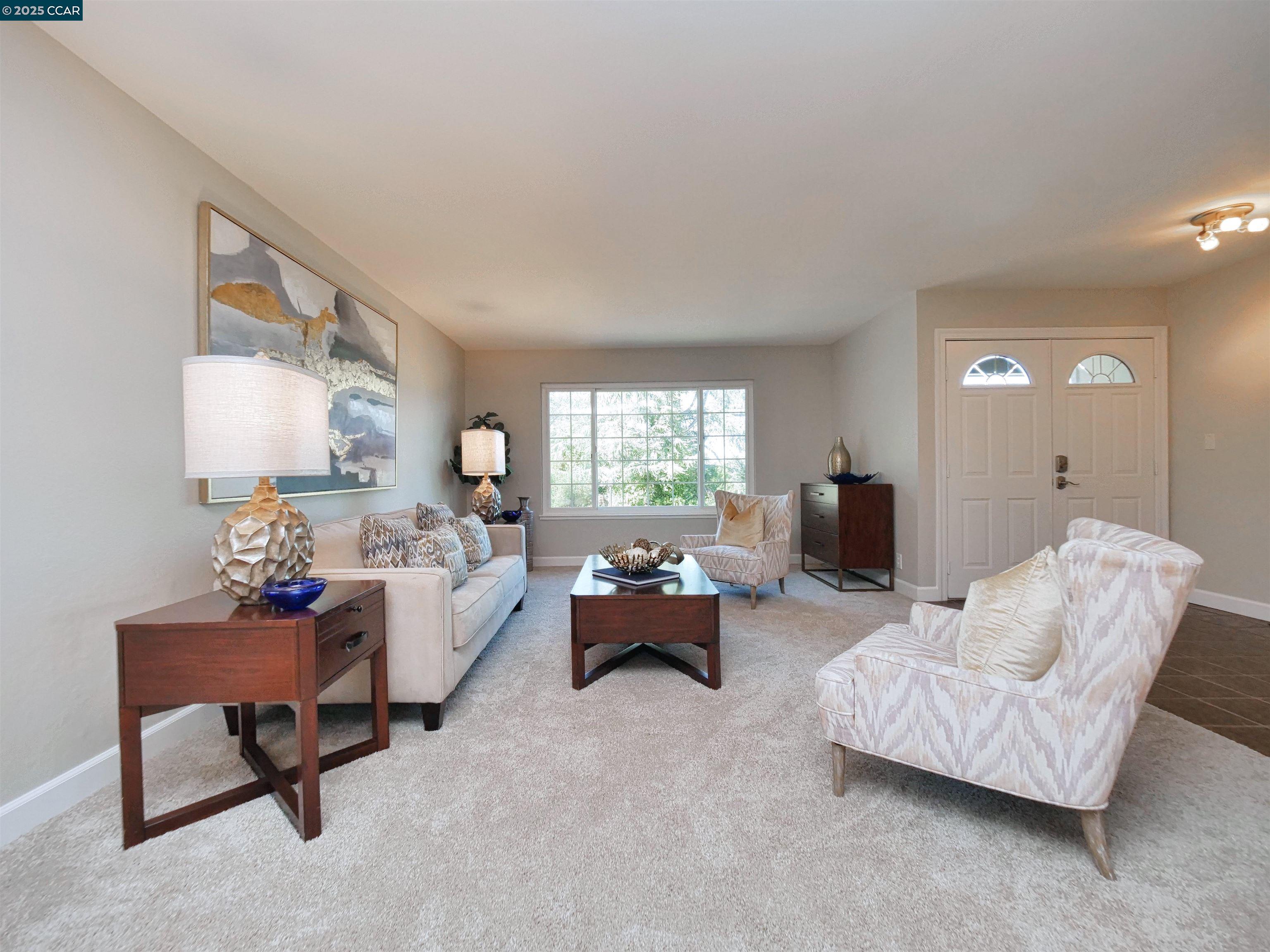 4044 Cowell Road Concord, CA 94518 - Photo 9 of 60 a living room with furniture and a large window