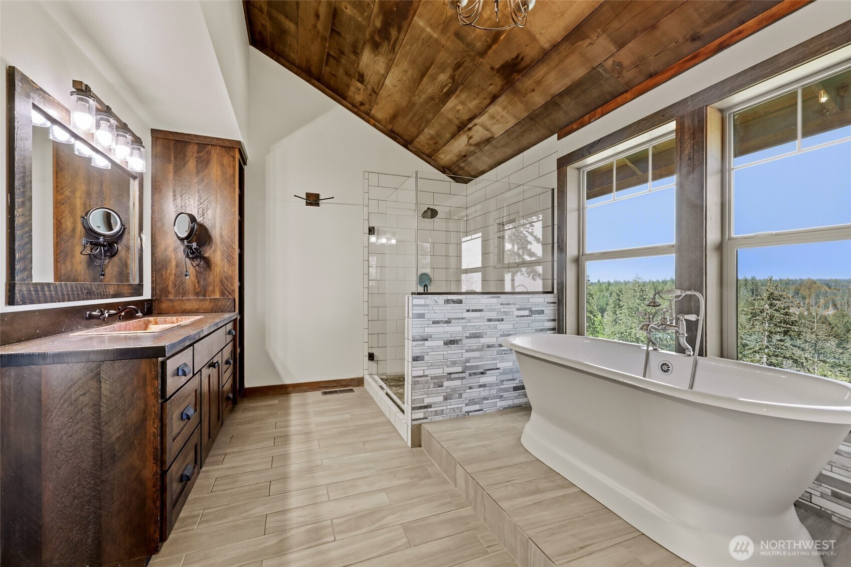 161 Northeast Belfair View Road Belfair, WA 98528 - Photo 15 of 40 a bathroom with a double vanity sink and a large mirror