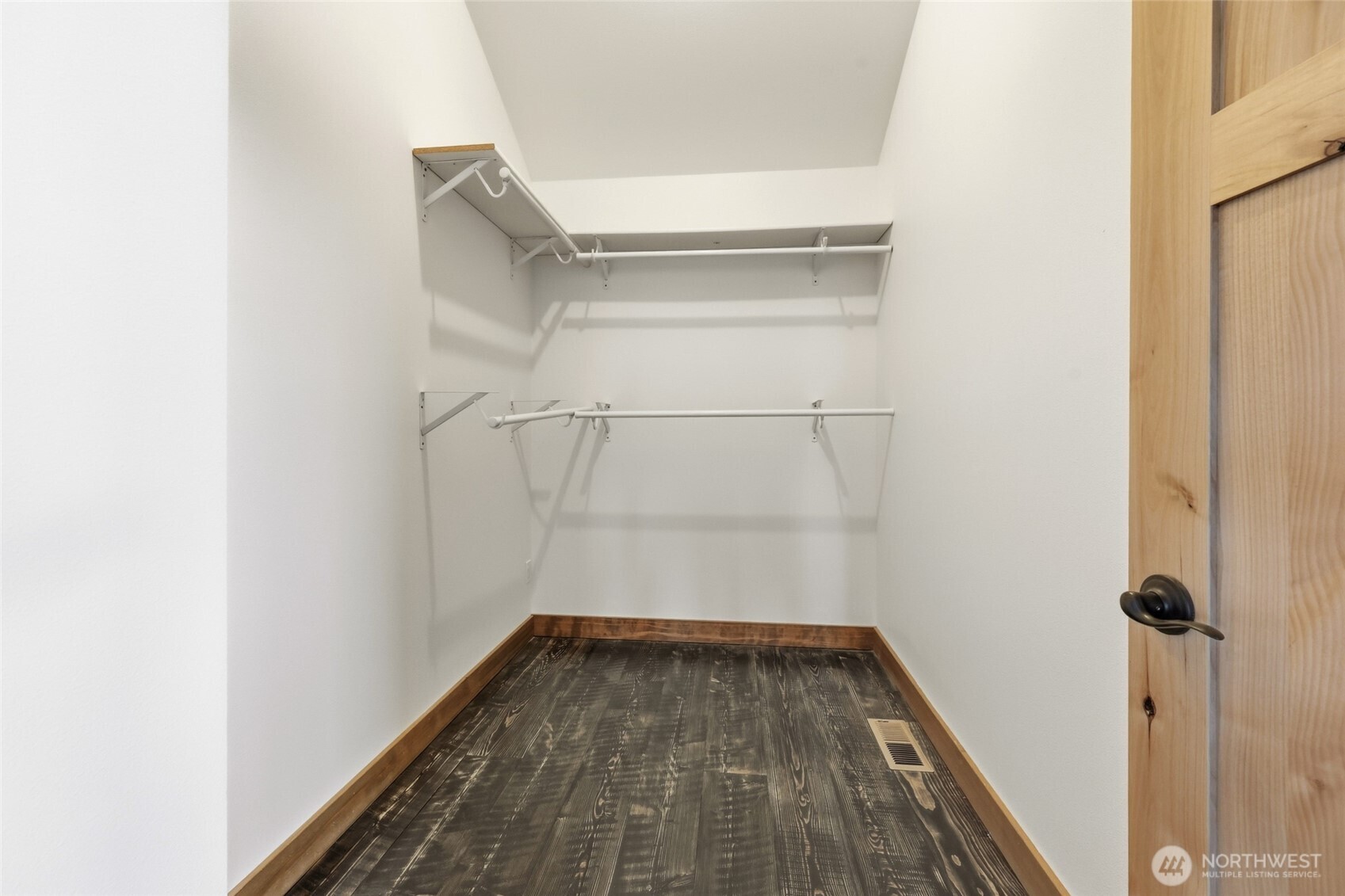 161 Northeast Belfair View Road Belfair, WA 98528 - Photo 17 of 40 a view of a room with racks on the wall