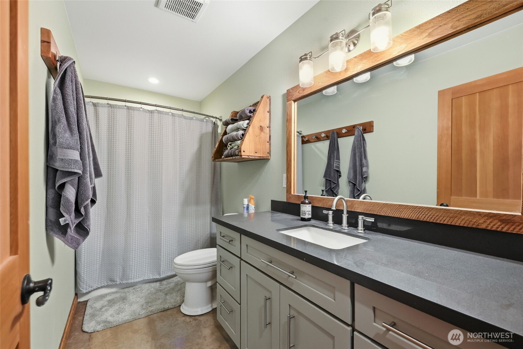 161 Northeast Belfair View Road Belfair, WA 98528 - Photo 36 of 40 a bathroom with a granite countertop sink toilet and shower