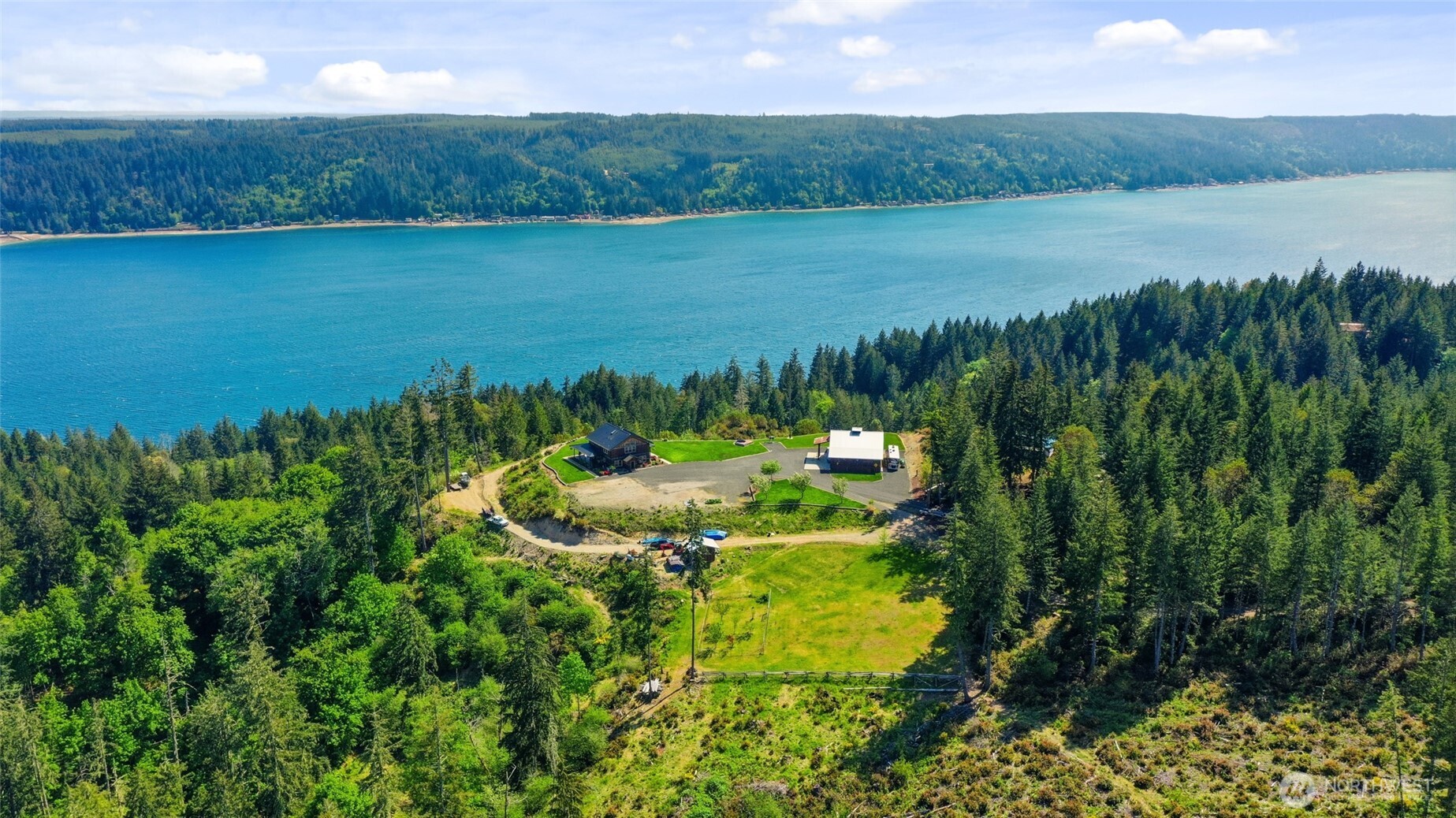 161 Northeast Belfair View Road Belfair, WA 98528 - Photo 40 of 40 a view of a lake and green valley