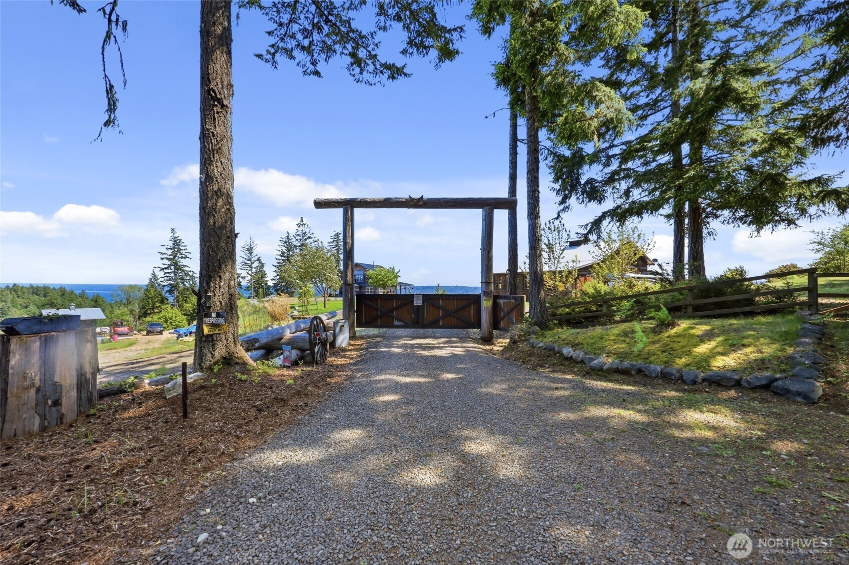 161 Northeast Belfair View Road Belfair, WA 98528 - Photo 5 of 40 a view of a street with big trees