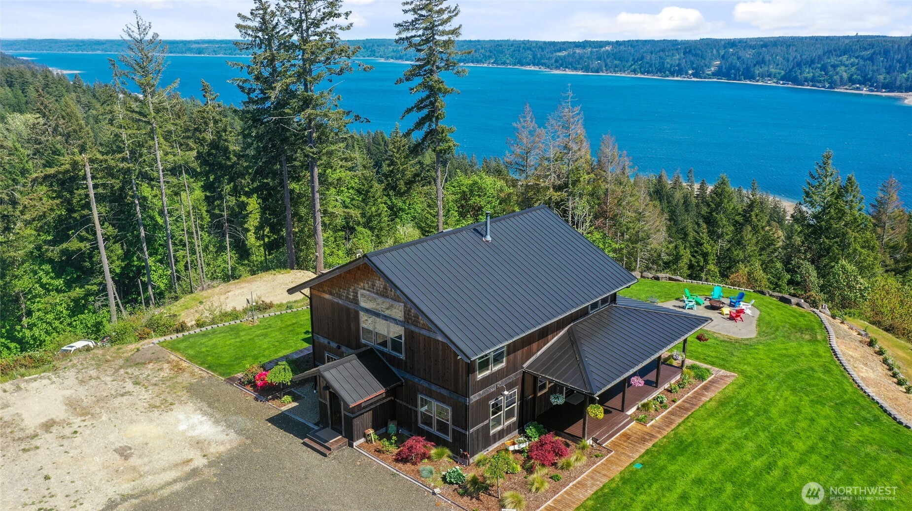 161 Northeast Belfair View Road Belfair, WA 98528 - Photo 7 of 40 an aerial view of a house having yard patio and swimming pool