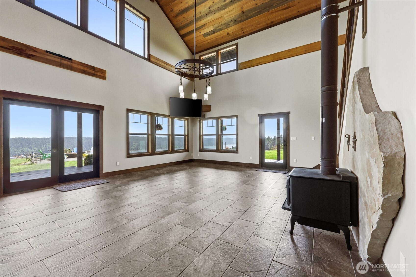 161 Northeast Belfair View Road Belfair, WA 98528 - Photo 9 of 40 a view of an entryway with a floor to ceiling window
