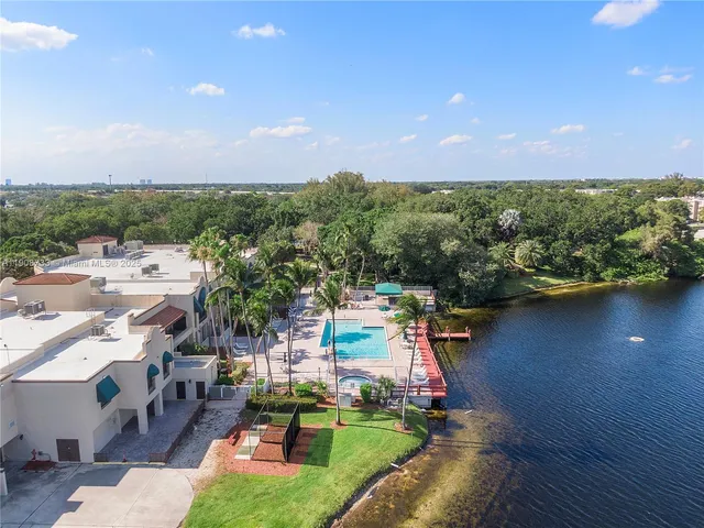 a sign that is on a bunch of flowers