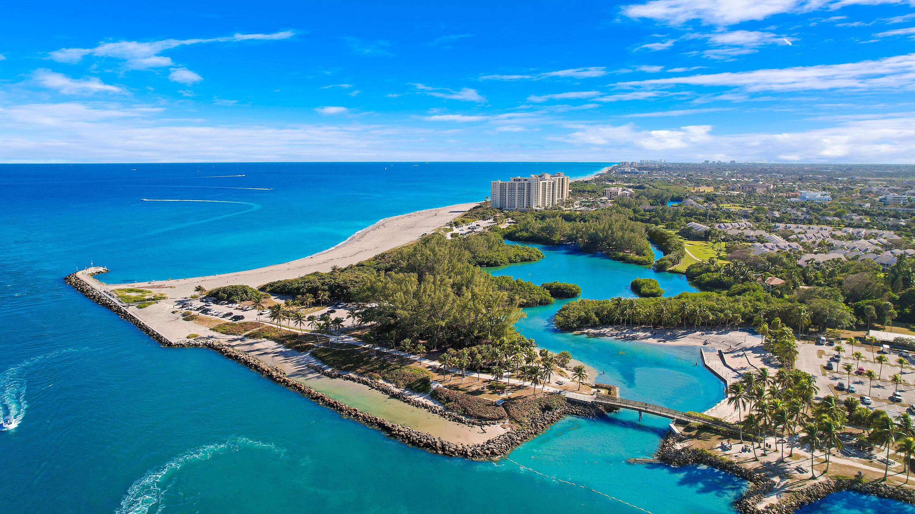 3900 County Line Road, Unit 4C Tequesta, FL 33469 - Photo 28 of 41 an aerial view of a house with a garden