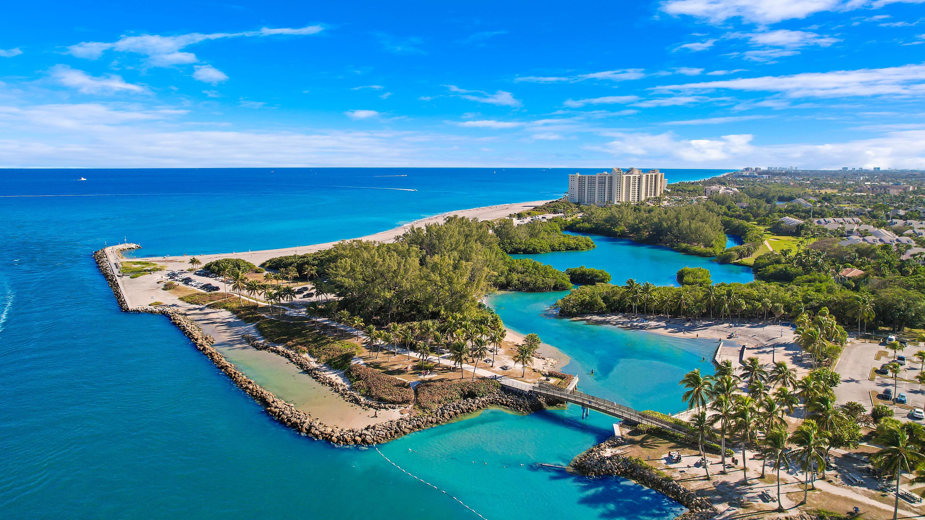3900 County Line Road, Unit 4C Tequesta, FL 33469 - Photo 29 of 41 a view of a lake with outdoor space