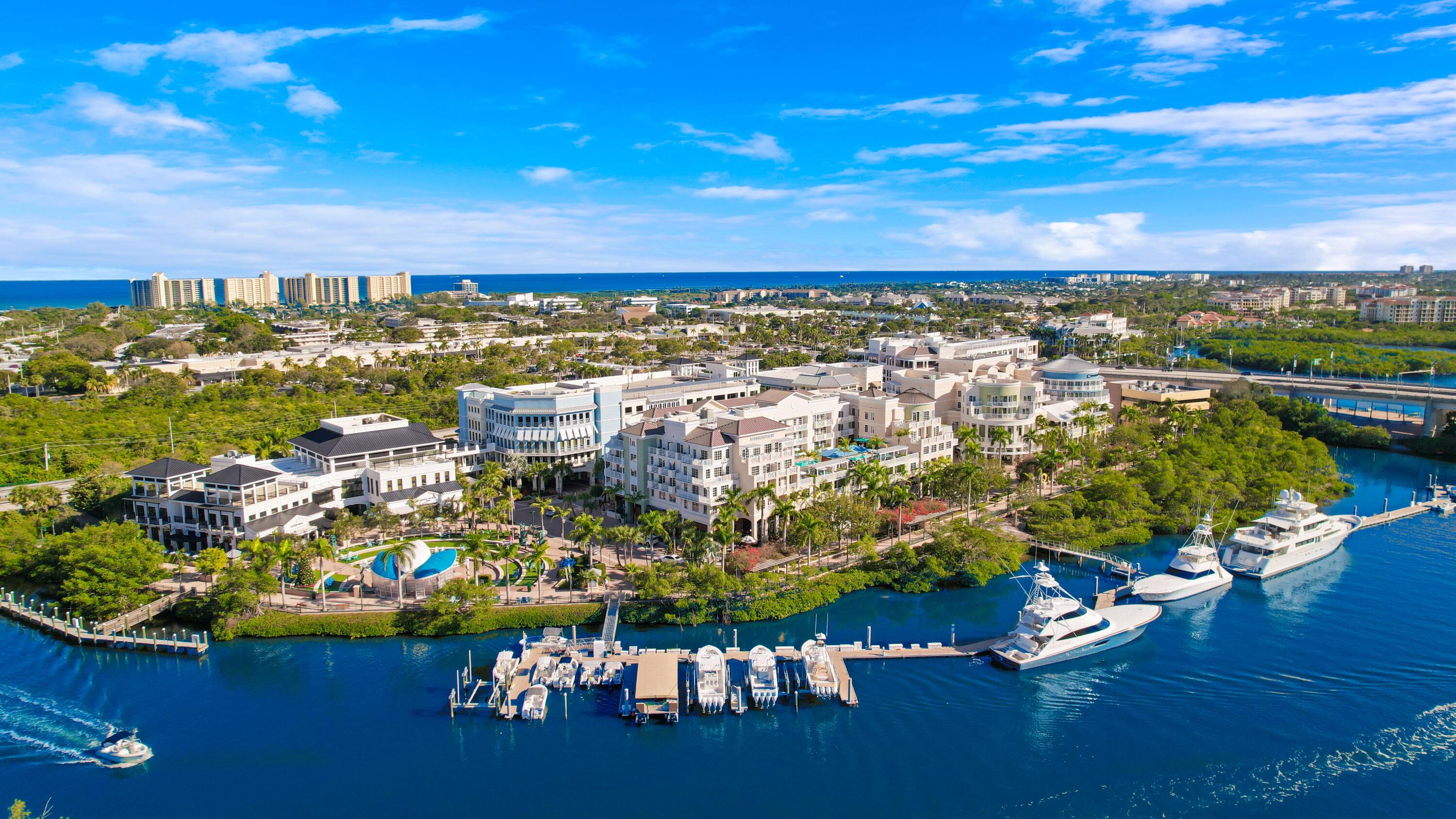 3900 County Line Road, Unit 4C Tequesta, FL 33469 - Photo 36 of 41 a view of a city with an ocean