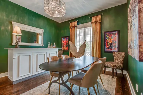 a spacious bathroom with a granite countertop sink mirror and