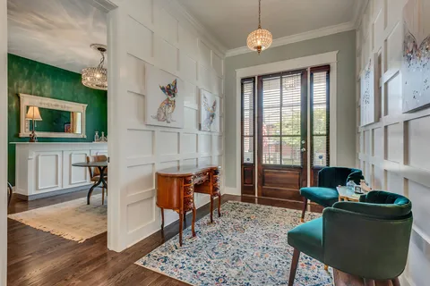 a view of a kitchen with a sink and a window