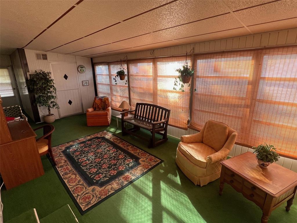 41 Royal Palm Circle Largo, FL 33778 - Photo 5 of 27 a living room with furniture rug and window
