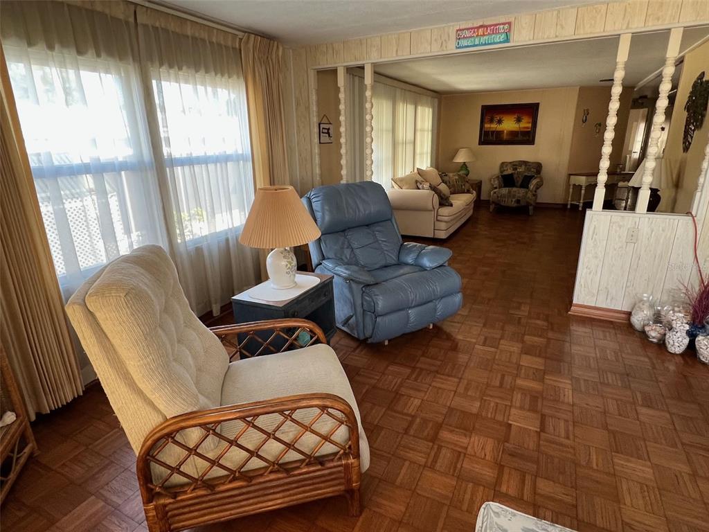 41 Royal Palm Circle Largo, FL 33778 - Photo 8 of 27 a living room with furniture and a window