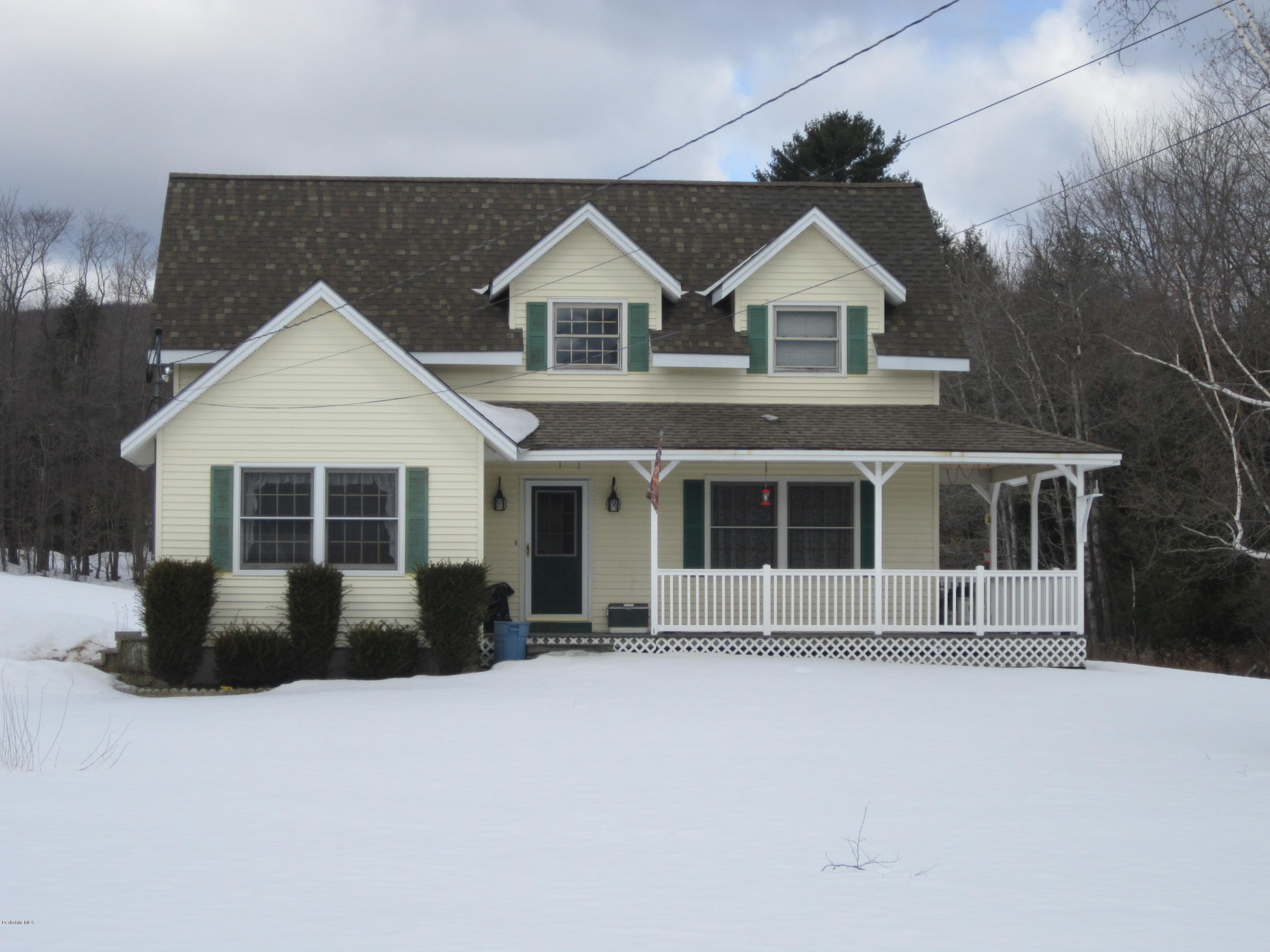 711 Middle Road Clarksburg, MA 01247 - Photo 1 of 10 a front view of a house with a yard