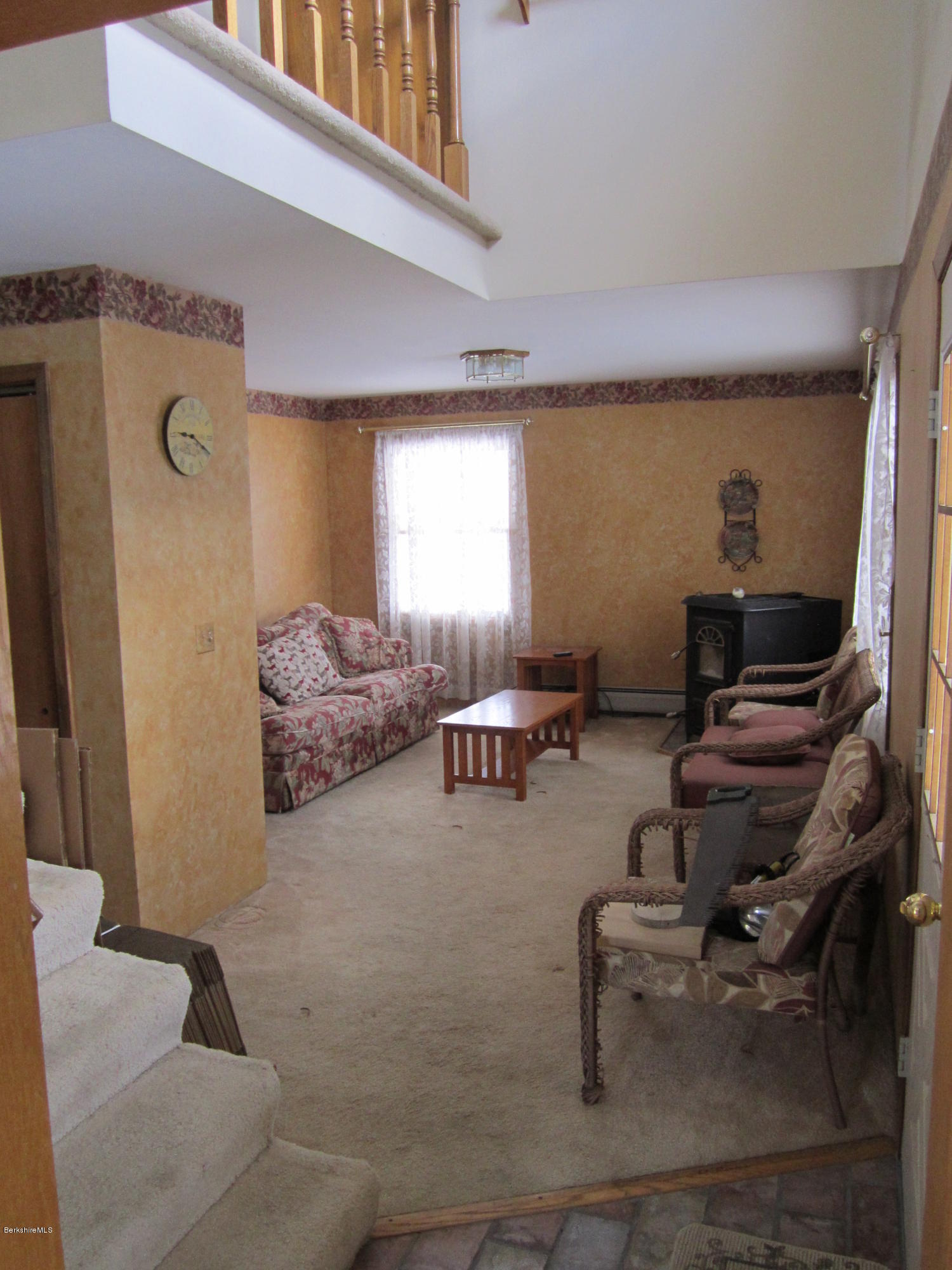 711 Middle Road Clarksburg, MA 01247 - Photo 5 of 10 a living room with furniture and a flat screen tv