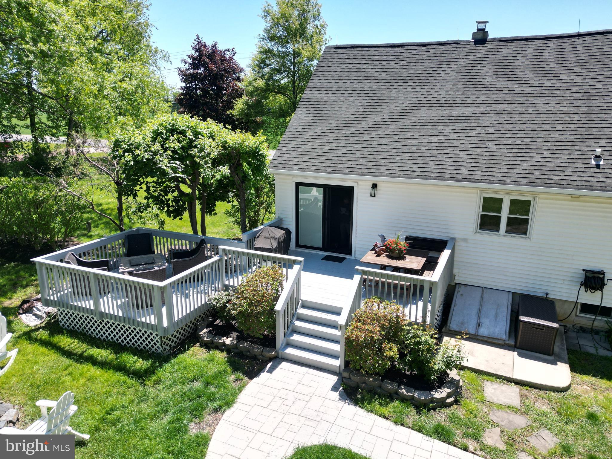 31 Bordentown Chesterfield Road Chesterfield, NJ 08515 - Photo 47 of 55 a view of a patio with couches table and chairs with wooden fence
