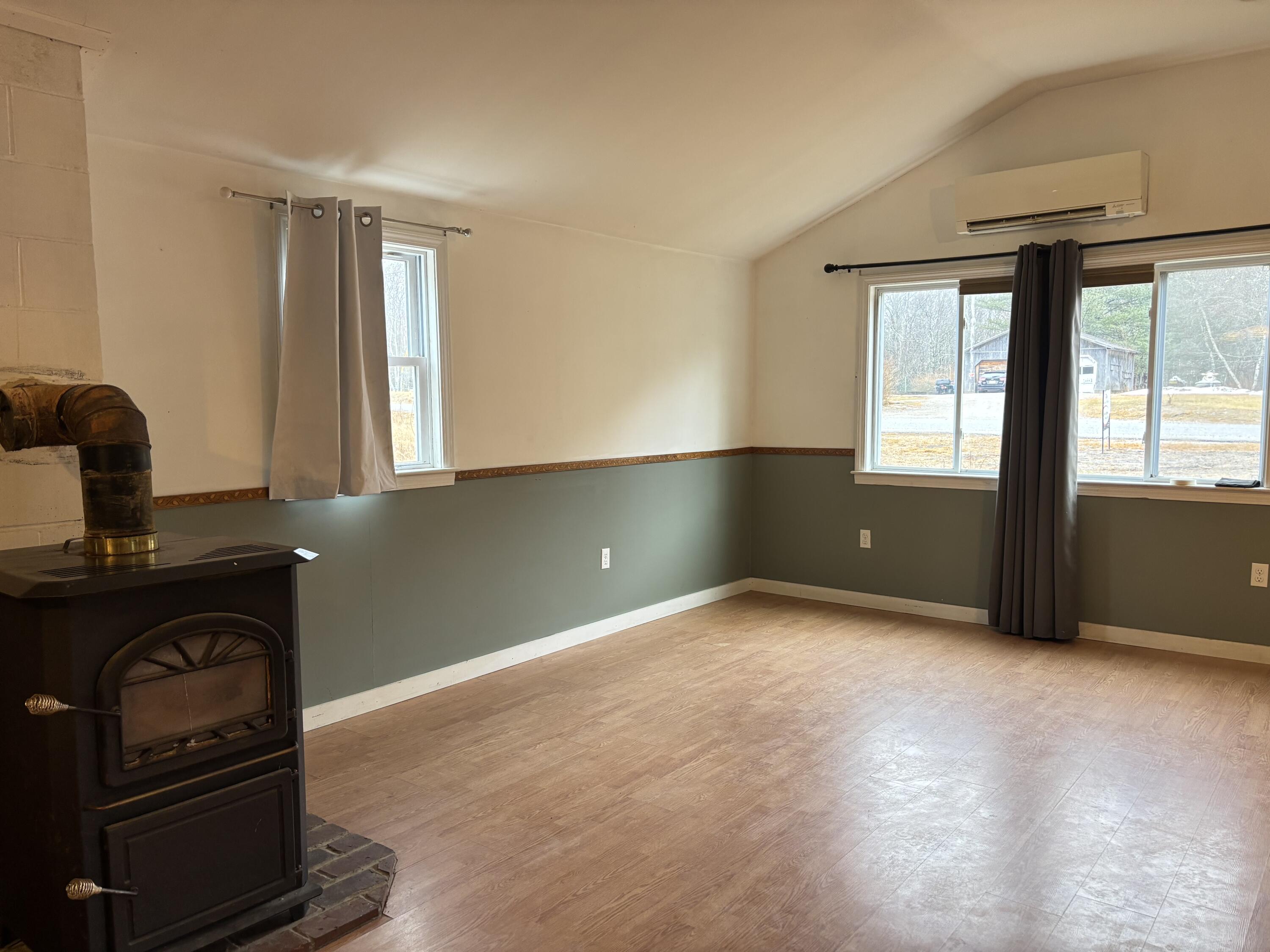94 Heath Road Milbridge, ME 04658 - Photo 6 of 15 Stove & Dining Room
