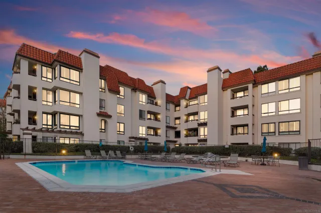 a front view of a building with street view