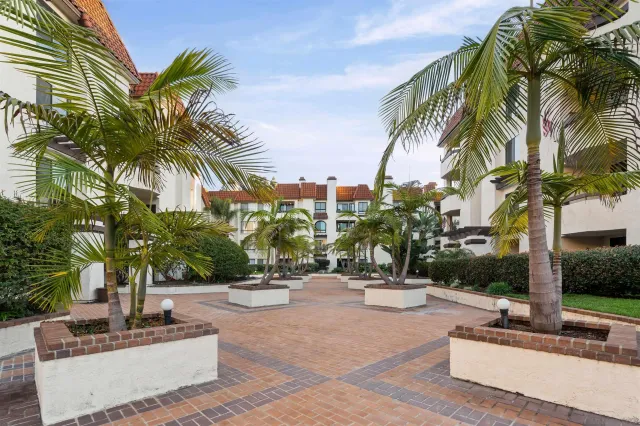 a view of a building with a yard