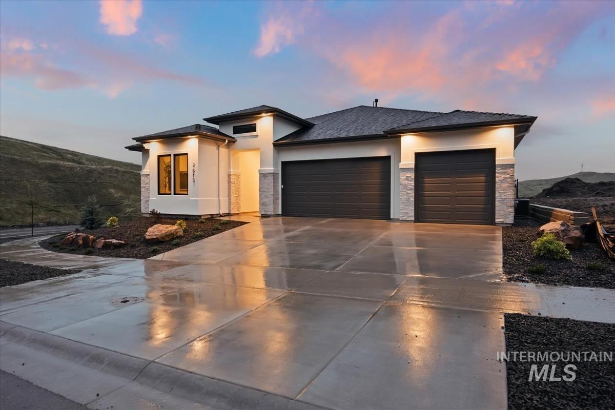 7615 Brown Way Eagle, ID 83714 - Photo 2 of 43 Contemporary exterior featuring stucco and stone accents