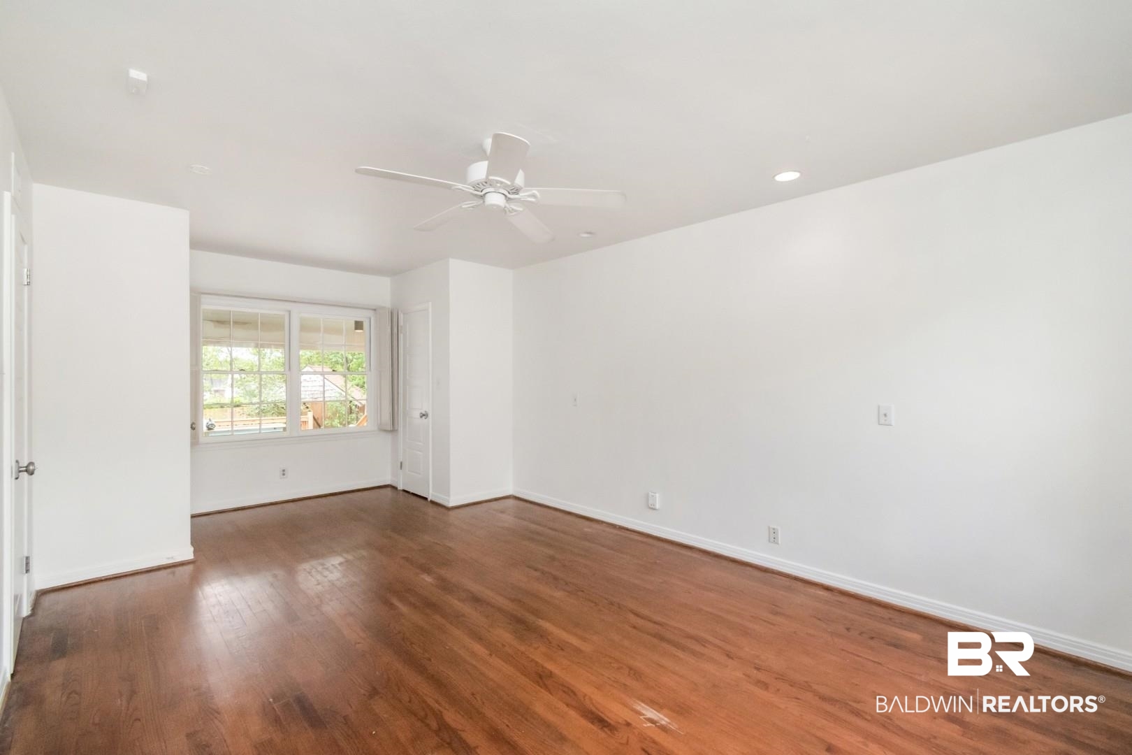 4 Turnout Lane Mobile, AL 36608 - Photo 24 of 53 Empty room featuring dark wood-style flooring, ceiling fan, and recessed lighting