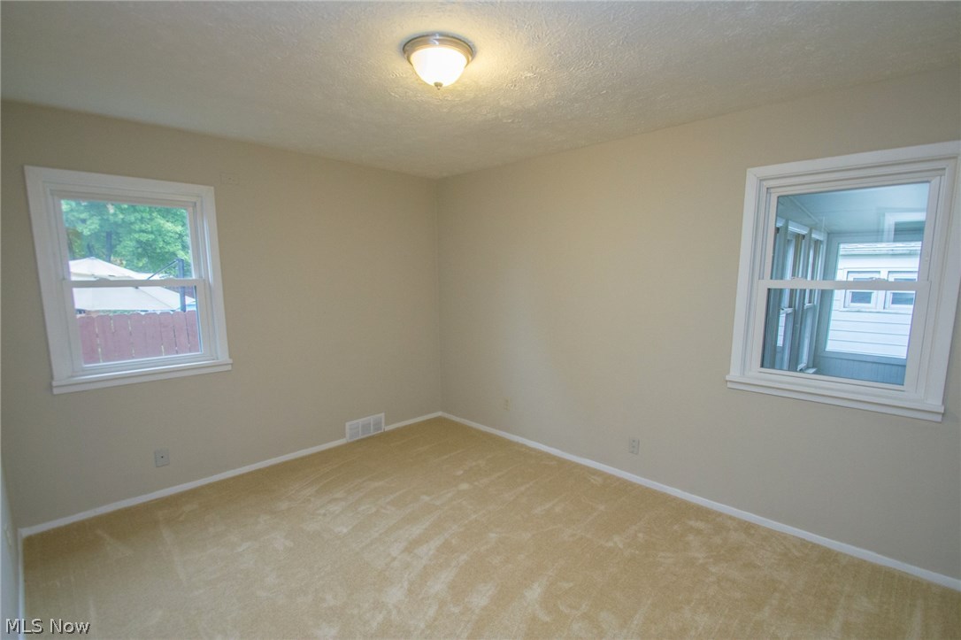 10571 Snow Road Parma Heights, OH 44130 - Photo 13 of 25 Bedroom 2 with newer carpet