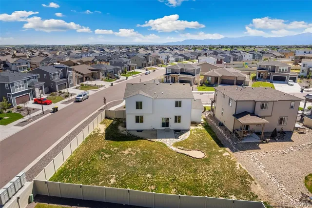 a view of a street with a building in the background