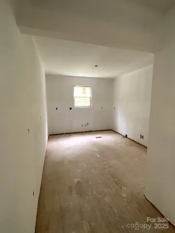 a view of empty room with a window