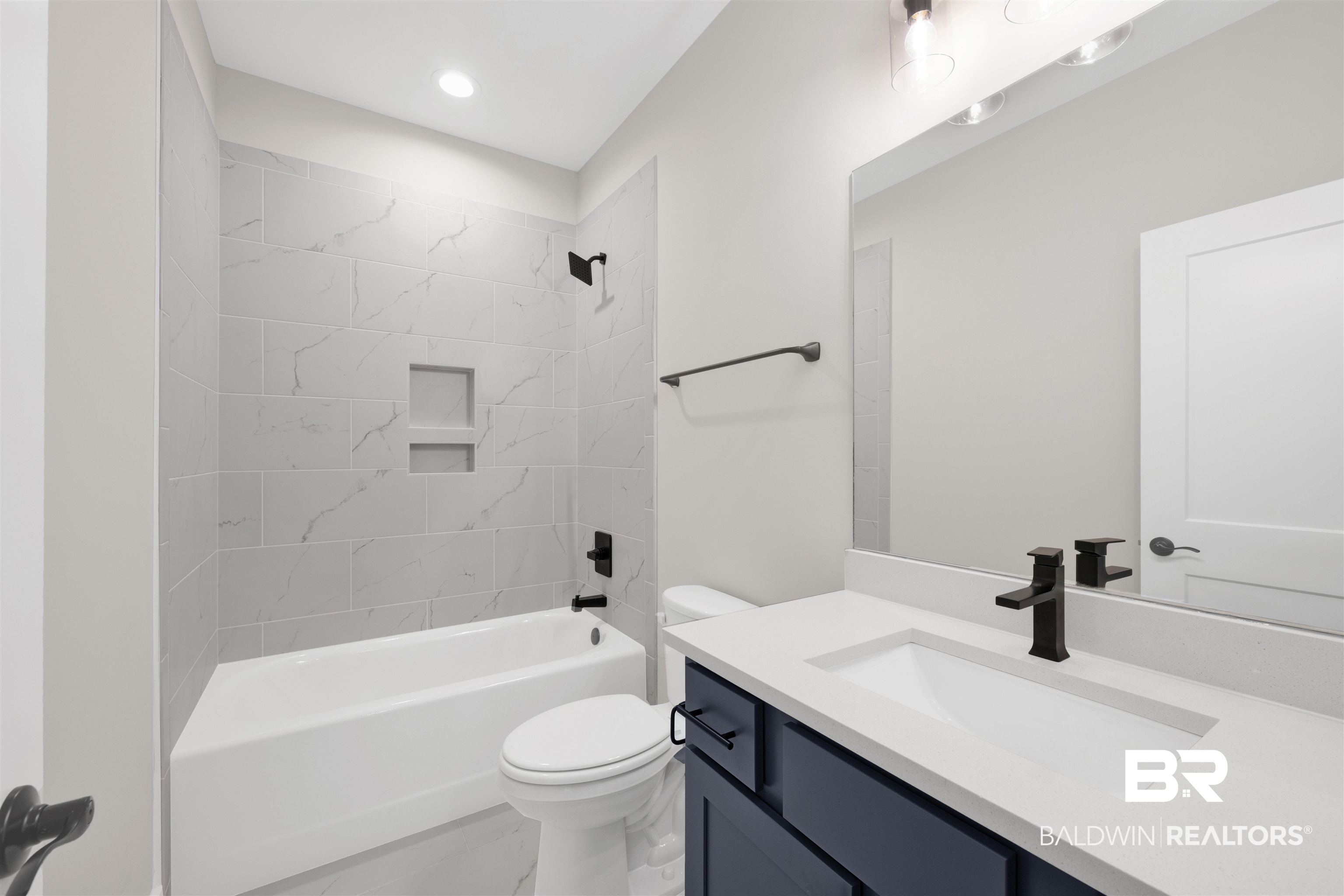 27315 Patch Pl Loop Daphne, AL 36526 - Photo 19 of 43 Full bath with vanity, bathing tub / shower combination, and recessed lighting