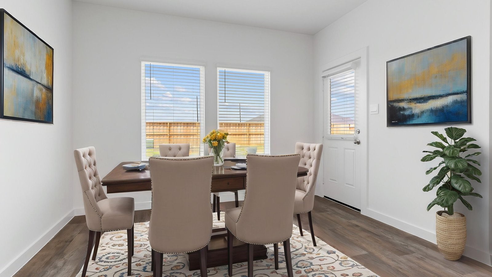 6120 Cherry Mdws Street Rosenberg, TX 77469 - Photo 19 of 39 a view of a dining room with furniture window and wooden floor