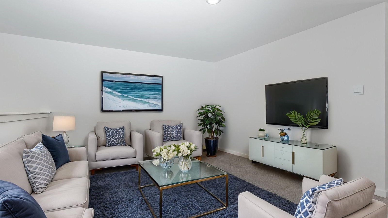 6120 Cherry Mdws Street Rosenberg, TX 77469 - Photo 28 of 39 a living room with furniture and a flat screen tv