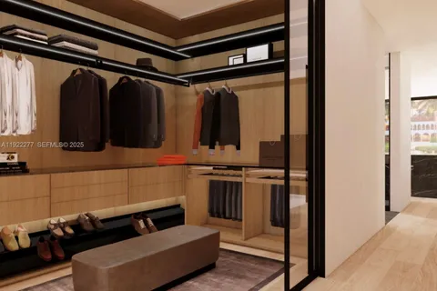 a room with gym equipment and a view of living room