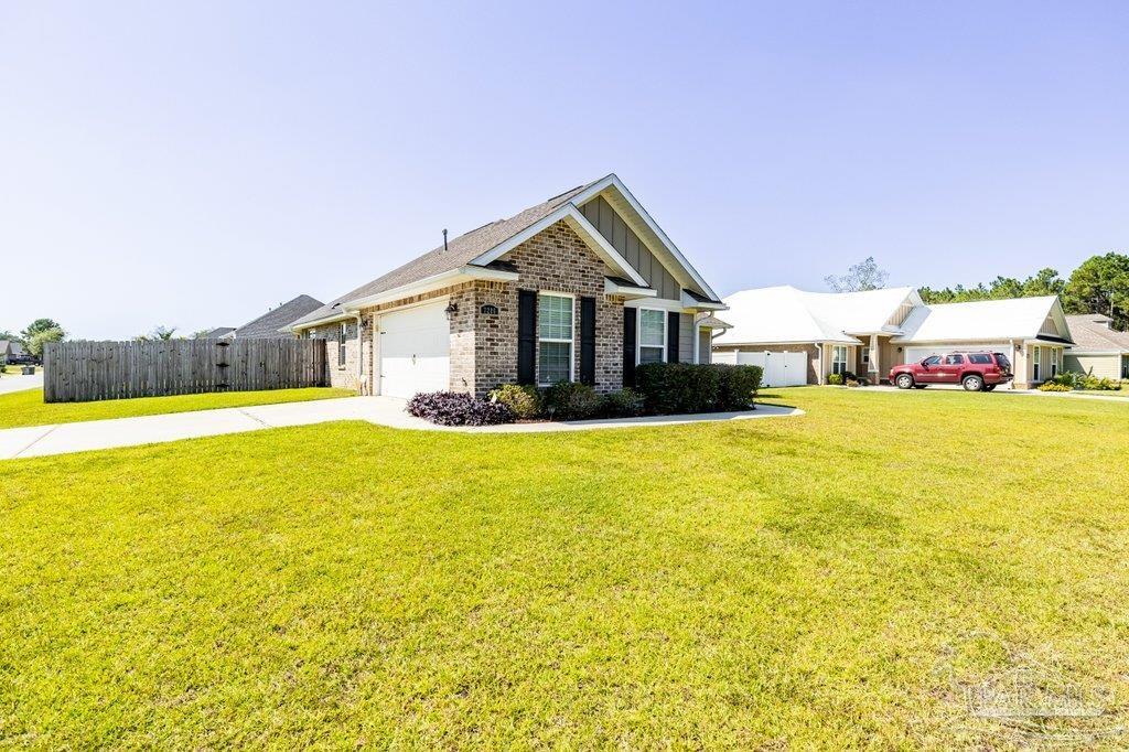 LARGE CORNER LOT , FRONT OF HOME