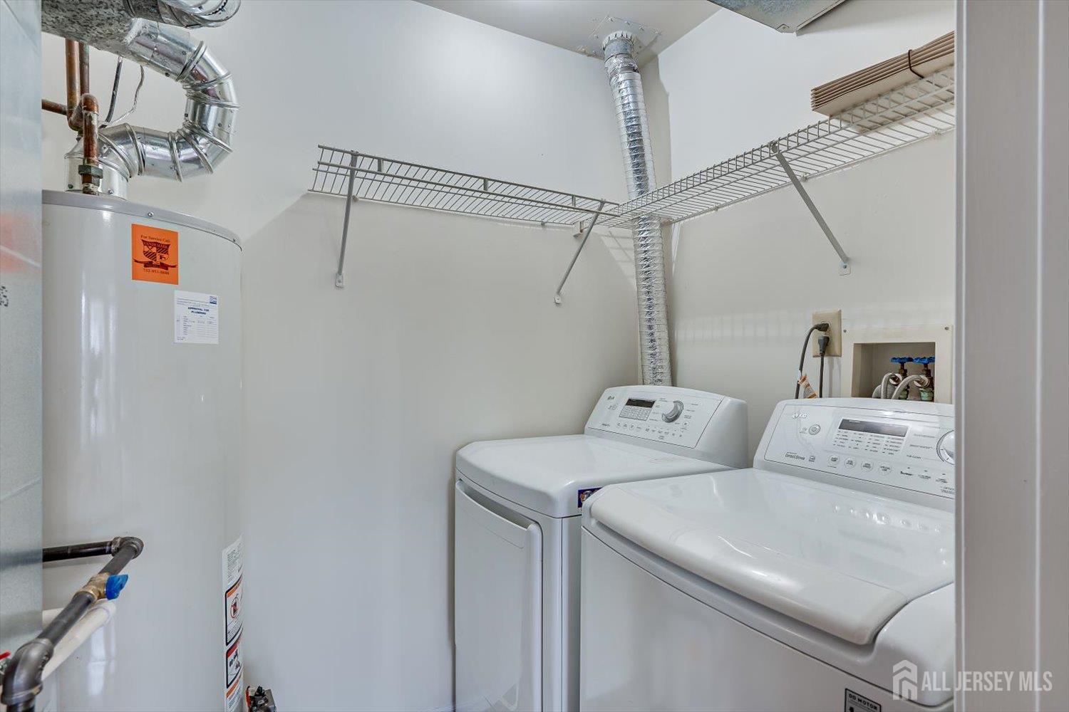919 Plymouth Road North Brunswick, NJ 08902 - Photo 16 of 33 a utility room with dryer and washer