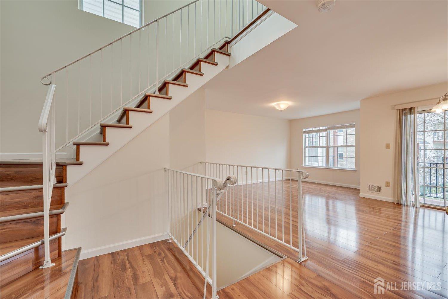 919 Plymouth Road North Brunswick, NJ 08902 - Photo 18 of 33 a view of entryway with wooden floor